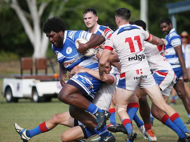 Henry Williams pushes his way through the Ivanhoe defenders in the Cairns District Rugby League (CDRL) Round 16 match between the Ivanhoe Knights and Cairns Brothers, held at the Smithfield Sporting Complex. Picture: Brendan Radke