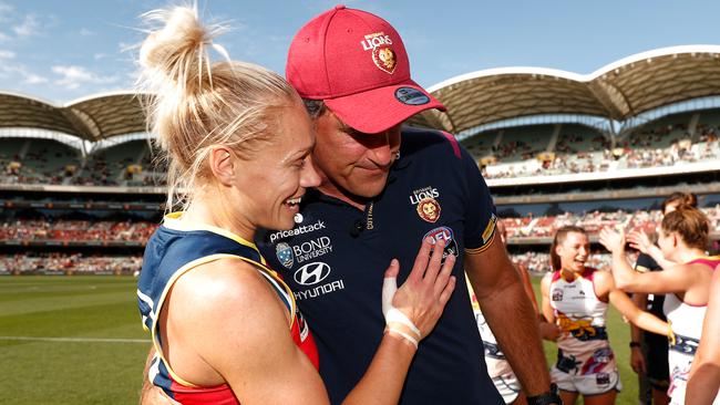 Erin Phillips congratulates Brisbane AFLW premiership coach Craig Starcevich.