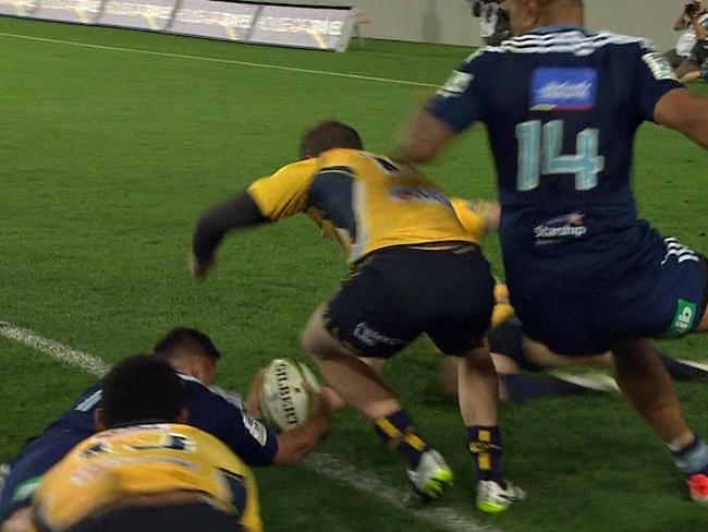 Daniel Bowden reaches out to score the opening try of the match