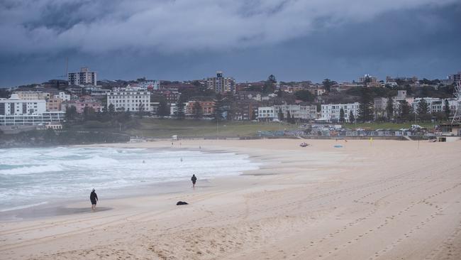 A near deserted Bondi Beach on Saturday morning. Picture: Julian Andrews