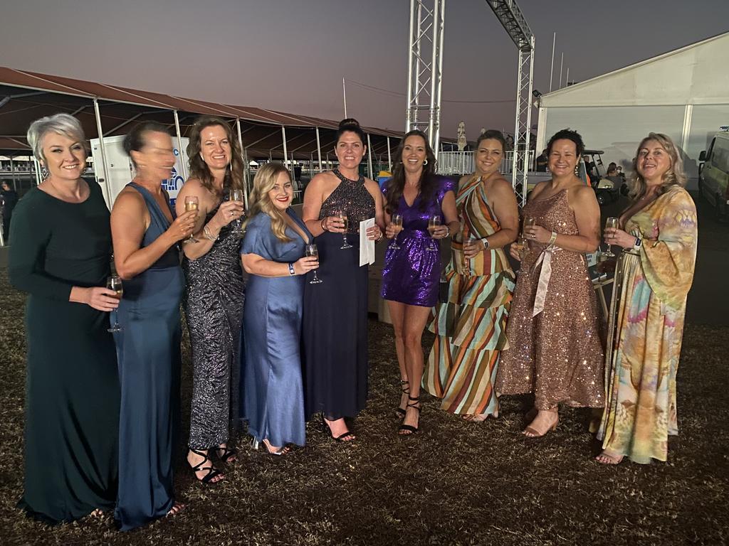 Justine Dwyer, Rachel Watts, Danielle Muegel, Steph Pledger, Tina Way, Laurie Van De Graff, Shona Abbott, Jaqueline Fryar and Rebecca Gotch enjoy the 2022 Darwin Cup Gala Ball. Picture: NT News