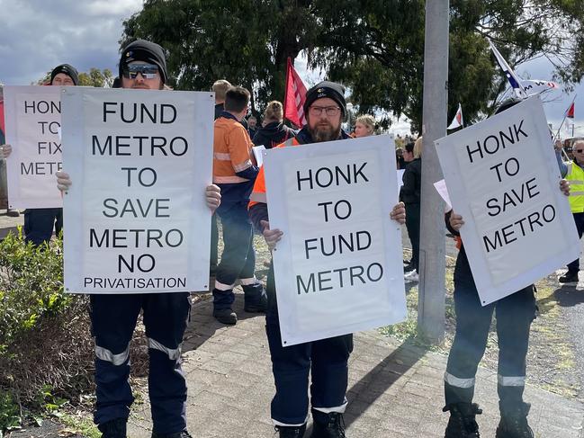 Metro workers taking action against the state government over pay and conditions. Picture: Sue Bailey