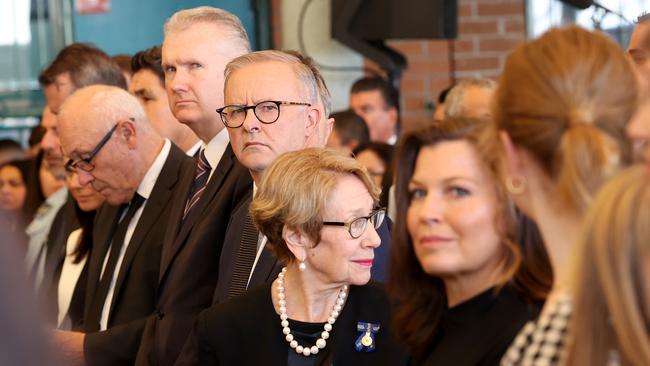 Labor leader Anthony Albanese joined in the front row by Jenny Morrison, wife of Prime Minister Scott Morrison. Picture: Toby Zerna