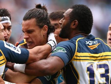 SYDNEY, AUSTRALIA - MARCH 22: Matt Toomua of the Brumbies celebrates scoring a try with team mates during the round six Super Rugby match between the Waratahs and the Brumbies at Allianz Stadium on March 22, 2015 in Sydney, Australia. (Photo by Cameron Spencer/Getty Images)