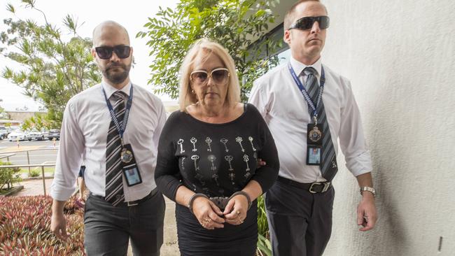 Sharon Graham is brought into custody at the Maroochydore Watchhouse under arrest for the alleged murder of her former partner Bruce Saunders. Picture: Lachie Millard