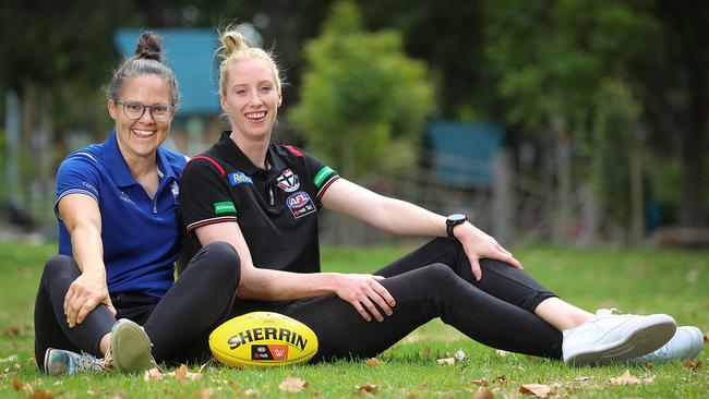 North Melbourne captain Emma Kearney and Saints co-captain Kate Shierlaw. Picture: Alex Coppel.