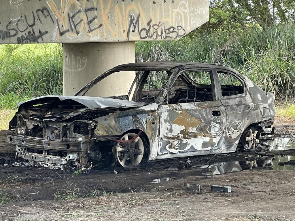 A car chair was seen just metres away from the burned out shell, with police investigating if it was thrown for the car or is unrelated. Photo: Fergus Gregg