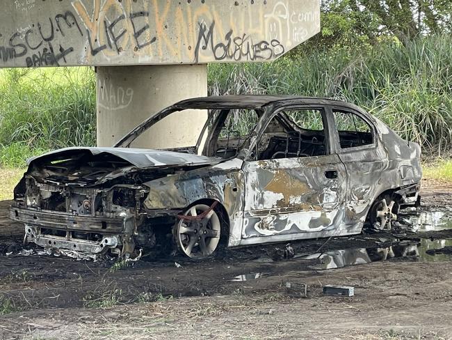 A car chair was seen just metres away from the burned out shell, with police investigating if it was thrown for the car or is unrelated. Photo: Fergus Gregg