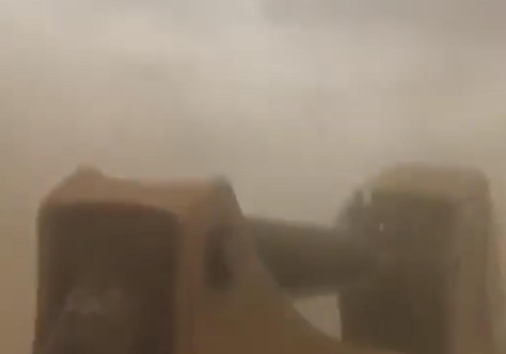 Digger Trucks Work Through Melbourne Dust Storm