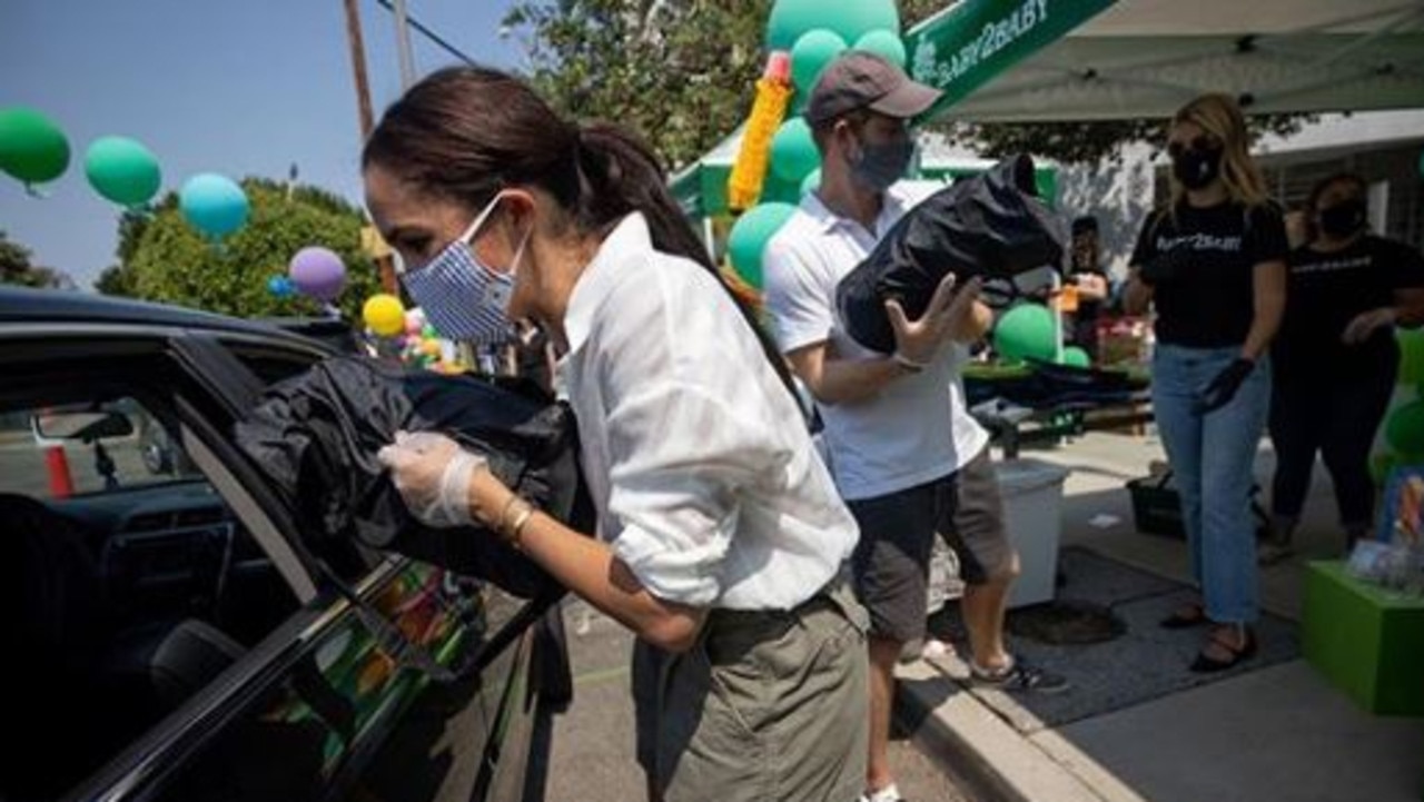 Meghan Markle and Prince Harry volunteer at a school charity drive in Los Angeles. Picture: Instagram