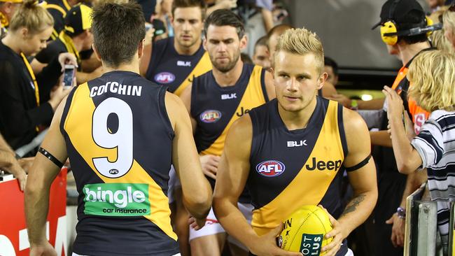 Trent Cochin, with his last name on his jumper, in Richmond’s Round 5, 2014 clash against Brisbane. The AFL trialled placing names on uniforms in this round. (Photo by Chris Hyde/Getty Images)