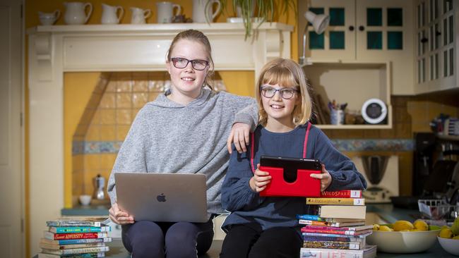 Siblings, Georgia, 12 and Amy, 10 Thurling of Bellerive both attend The Cottage School in Bellerive. Picture: LUKE BOWDEN