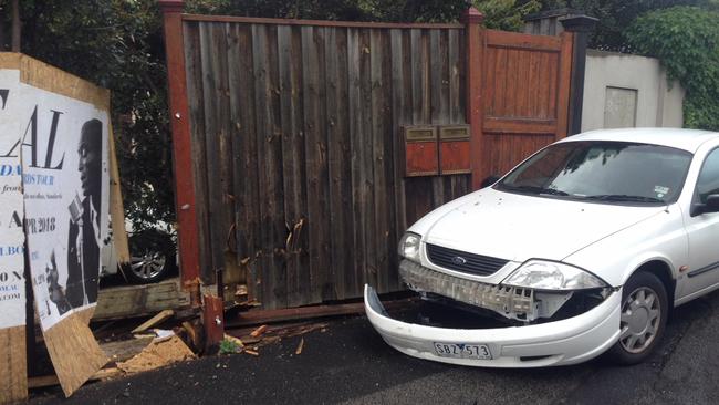 The car crashed into the front fence of 498 Punt Rd. Pic Supplied.