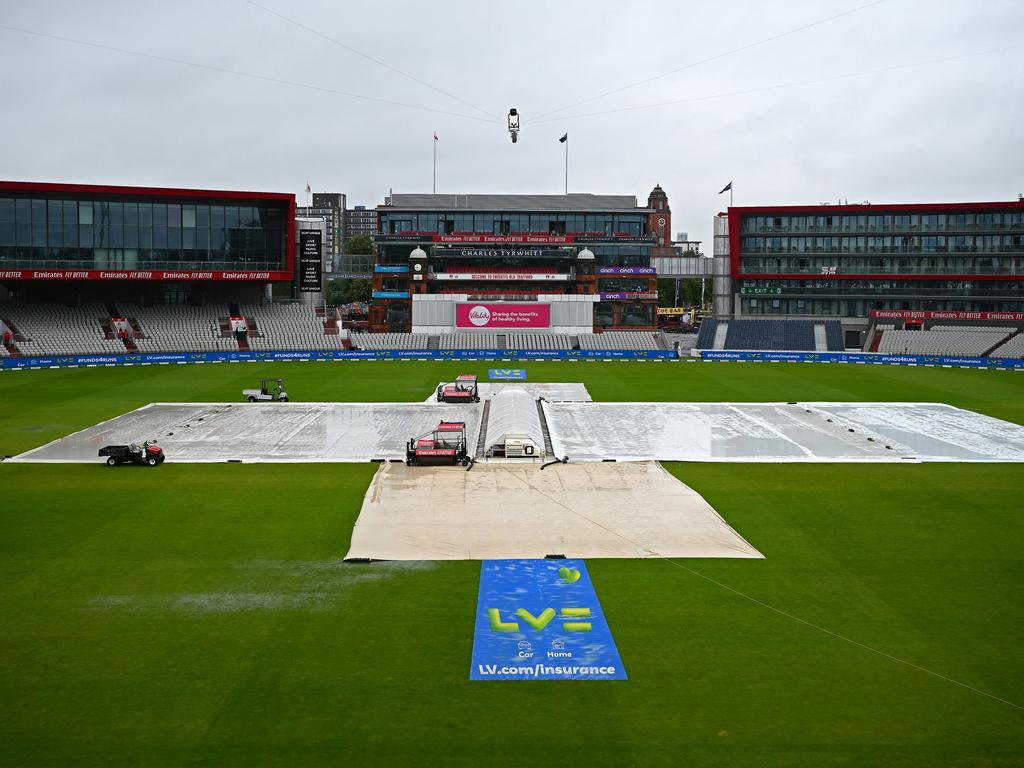 The covers are on at Old Trafford before the fourth day of play. Picture: Clive Mason/Getty Images.