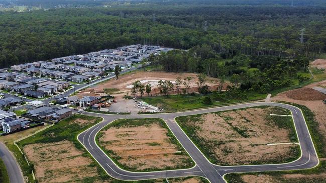 Vacant land sectioned off for housing in Sydney’s western suburbs. Picture: Getty Images