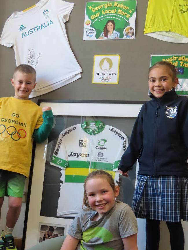 Georgia Baker's second cousins Archie Dawson, Isla Smith (front) and Maggie Cullen, all seven at Perth Primary's 'Baker Olympic shrine'. Picture: Jon Tuxworth