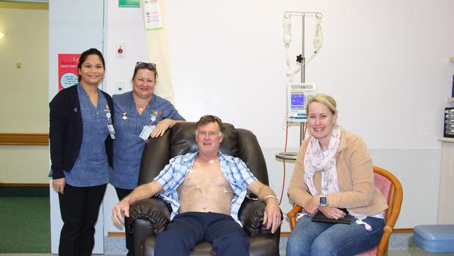 Mater Hospital Gladstone nurses Cindy Castaneros, Tracey McLucas, Rick Niven and his wife Christine during chemo treatment.