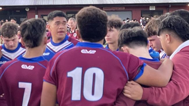 Azariah Toki-Matauri (third left) lays down the law to his Wavell teammates.