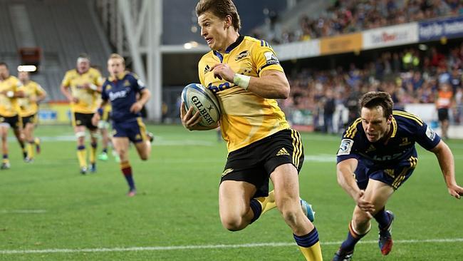 Beauden Barrett scores a try for the Hurricanes.