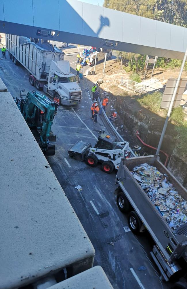 Work crews continued working into the afternoon to remove the truck. Picture: Twitter / Steve Hart