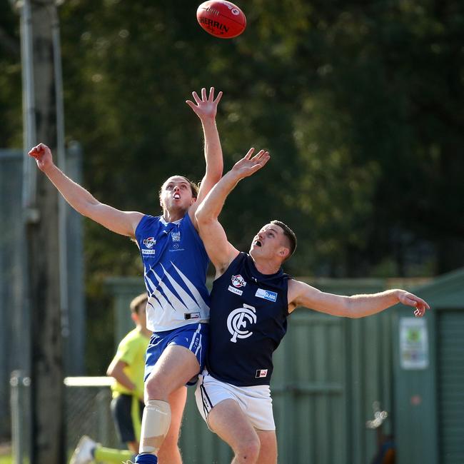 Joel Koger of Croydon (right) contests with Hannin Mundy of East Ringwood on Saturday. Picture: Hamish Blair