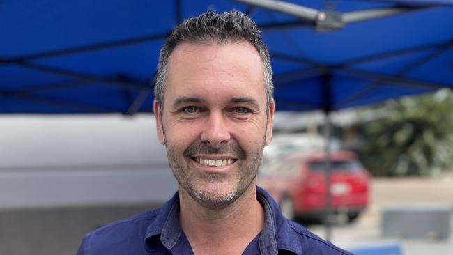 LNP Townsville candidate Adam Baillie at Cotters Markets the day before pre-poll