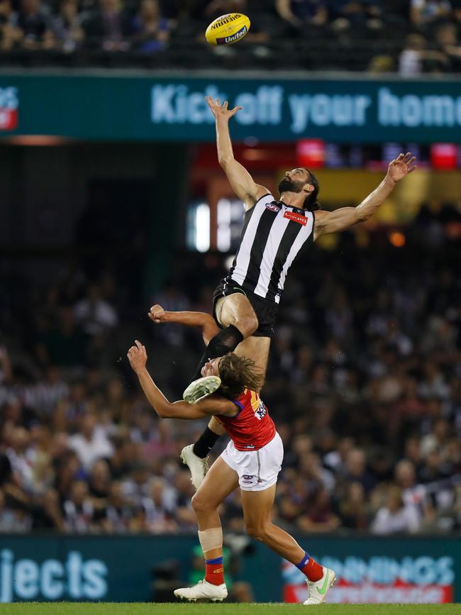 Grundy flies over Fullarton. Picture: Michael Willson/AFL Photo