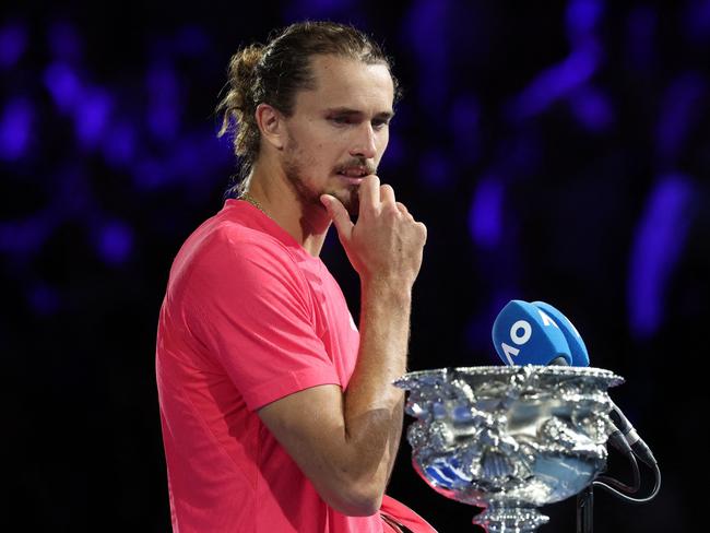 Germany's Alexander Zverev prepares to address the crowd after defeat against Italy's Jannik Sinner during their men's singles final match on day fifteen of the Australian Open tennis tournament in Melbourne on January 26, 2025. (Photo by DAVID GRAY / AFP) / -- IMAGE RESTRICTED TO EDITORIAL USE - STRICTLY NO COMMERCIAL USE --