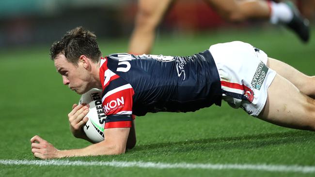 The Roosters' Luke Keary scores a try during the NRL match between Sydney and the Newcastle Knights at the SCG on Saturday. Picture. Phil Hillyard