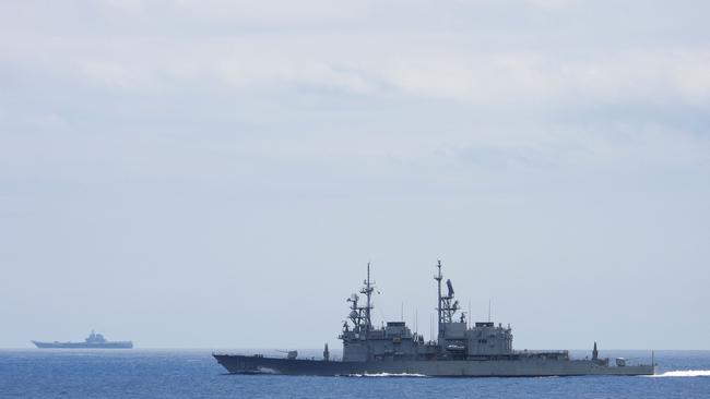 A Taiwanese Keelung class warship shadows Chinese aircraft carrier Shandong. Picture: Taiwan Defence Ministry via AFP