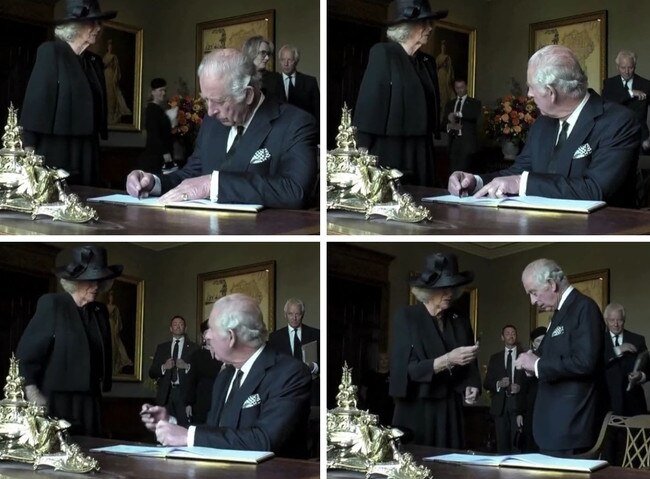 King Charles III battles the pen at Hillsborough Castle.