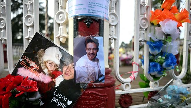 Flowers and pictures to former One Direction singer Liam Payne are displayed in his hometown in Wolverhampton, central England. Picture: AFP