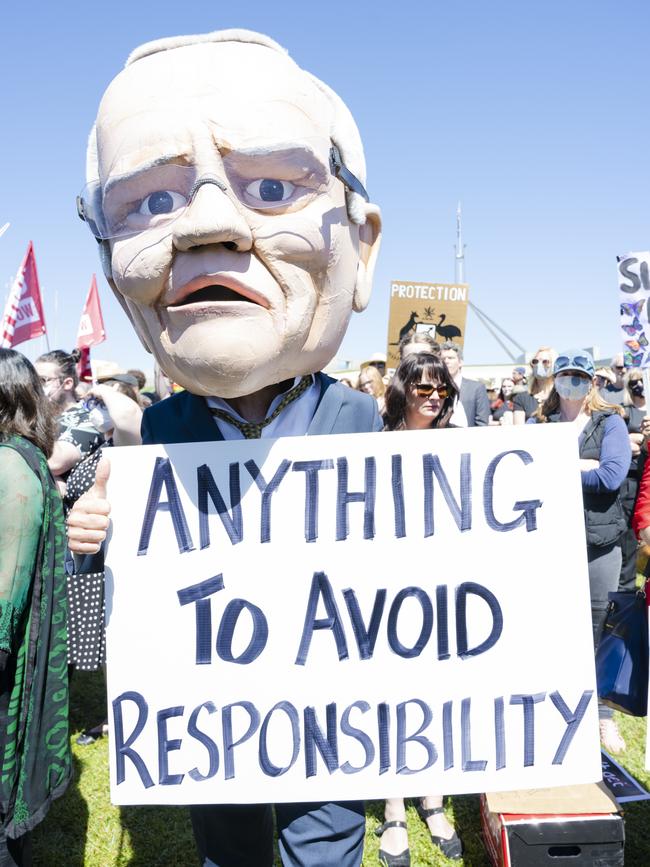 Protests attend the March 4 Justice rally in Canberra.