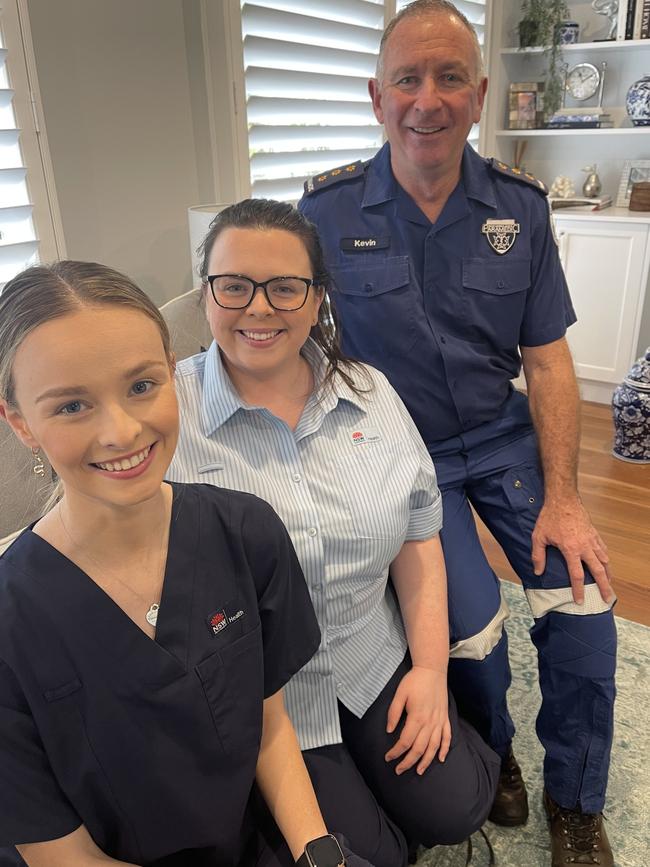 NSW Ambulance Inspector paramedic Kevin McSweeney with his daughters Catie and Erin who are nurses.