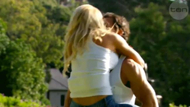 ... and straight into his arms. Picture: Channel Ten