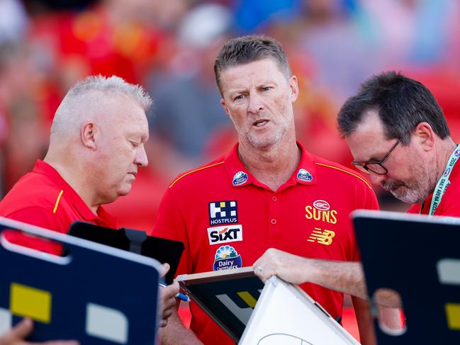 Damien Hardwick (centre) has guided the Suns to back-to-back wins. Picture: Dylan Burns/AFL Photos via Getty Images