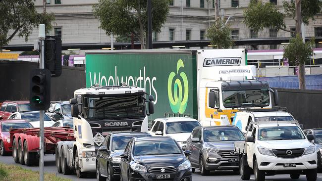 Drivers have been warned of delays through parts of the CBD when Metro Tunnel work closes a lane of Flinders St for up to four years. Picture: Ian Currie