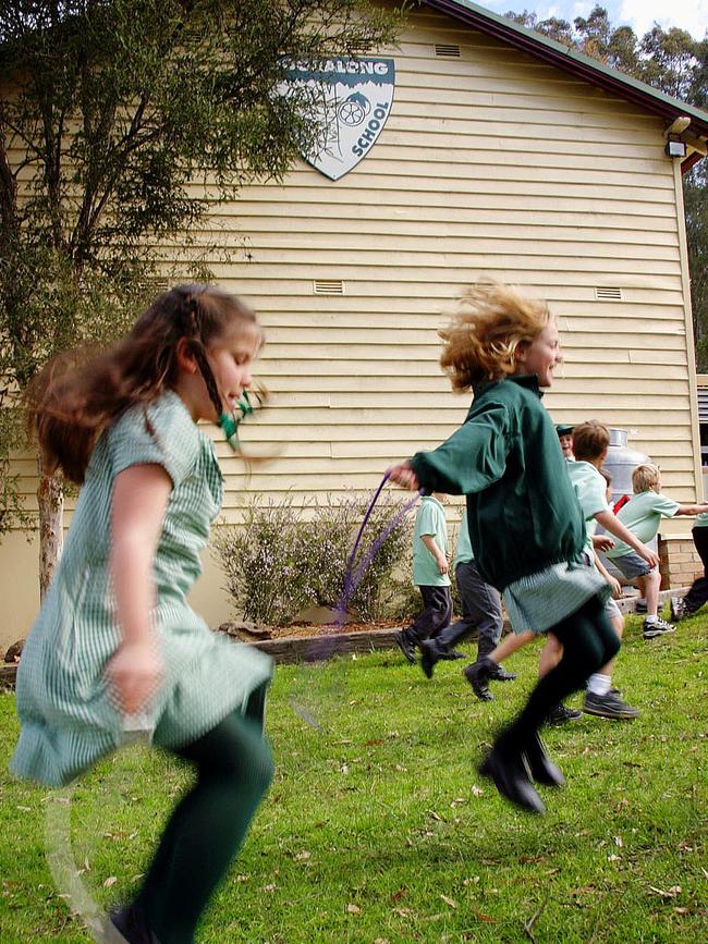 Dooralong Public School pupils playing in the schoolyard back in 2003. Picture: Waide Maguire