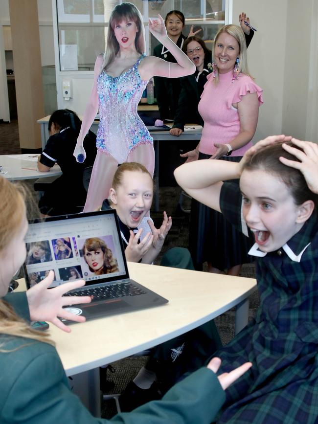 Year 6 girls at Seymour College got the surprise of their young lives, when Taylor Swift came to their school. Lainey, Siena and Greta (at front). Picture Dean Martin