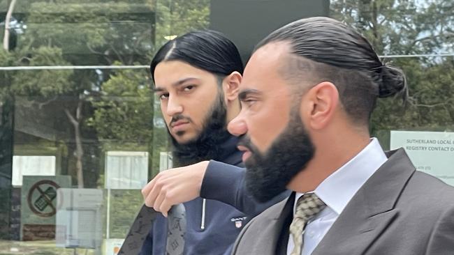 Abdullah Qureshi (left) with defence lawyer Oussama Elfawal (right) leaving court. Picture: Ashleigh Tullis