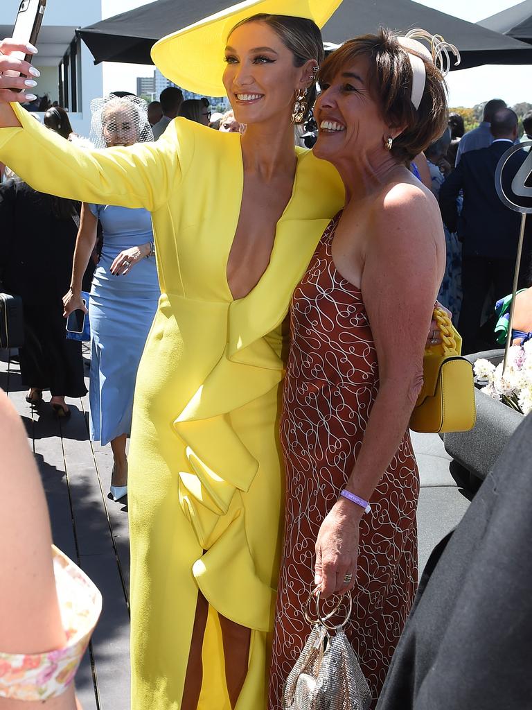 Delta Goodrem poses with a fan at the Lexus marquee. Picture: NCA NewsWire / Josie Hayden