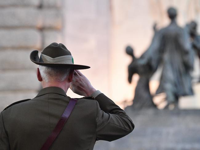 **RE-TRANSMISSION OF IMAGE ID: 20200425001465174849 TO CORRECT YEAR**  A general view during the Anzac Day Dawn Service at the National War Memorial in Adelaide, Saturday, April 25, 2020. Anzac Day is a national day of remembrance to commemorate the service and sacrifice of Australian and New Zealand service men and women. Due to COVID-19 restrictions marches and commemorative services have been banned for the first time in more than a century. (AAP Image/David Mariuz) NO ARCHIVING