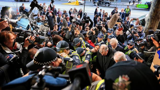 Cardinal George Pell arrives at Melbourne Magistrates Court in July before facing a filing hearing on historical sexual assault charges. Picture: Mark Stewart