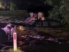 Four people were saved from the bonnet of a ute washed off a causeway near Muswellbrook. Picture: Edinglassie Rural Fire Brigade.