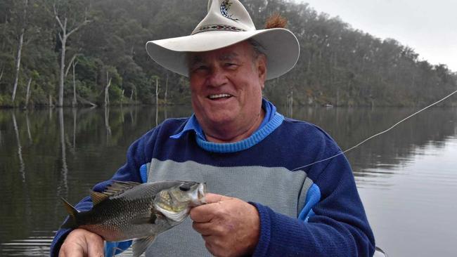 One that did not get away, but which was returned to the water later, was this Australian bass caught by Don MacAulay of the Lake Borumba Fish Stocking Association. Picture: Arthur Gorrie