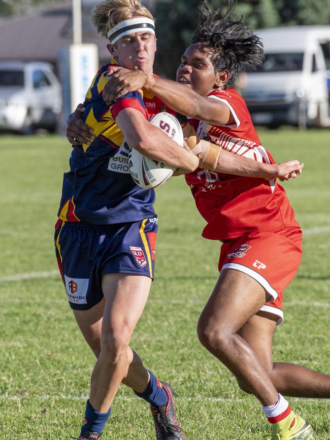 Liam Doolan, right, of the Bulls worked hard. Picture: Nev Madsen.