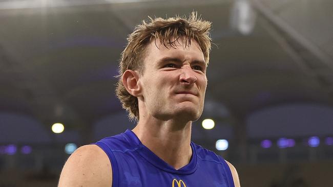 PERTH, AUSTRALIA - MARCH 17: Harris Andrews of the Lions leads the team from the field after being defeated during the round one AFL match between Fremantle Dockers and Brisbane Lions at Optus Stadium, on March 17, 2024, in Perth, Australia. (Photo by Paul Kane/Getty Images)