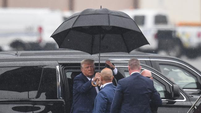 Donald Trump arrives at Ronald Reagan Washington National Airport in Arlington, Virginia, after his arraignment on Thursday. Picture: AFP