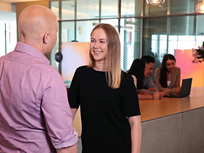 Head of talent acquisition at PwC, Rob Dunderdale, with Tilly Cooper. Picture: Adam Yip