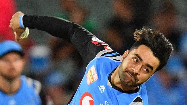 Rashid Khan of the Strikers bowls during the Big Bash League match between the Adelaide Strikers and the Sydney Sixers at Adelaide Oval on January 6, 2019 in Adelaide, Australia. Picture: Daniel Kalisz/Getty Images.